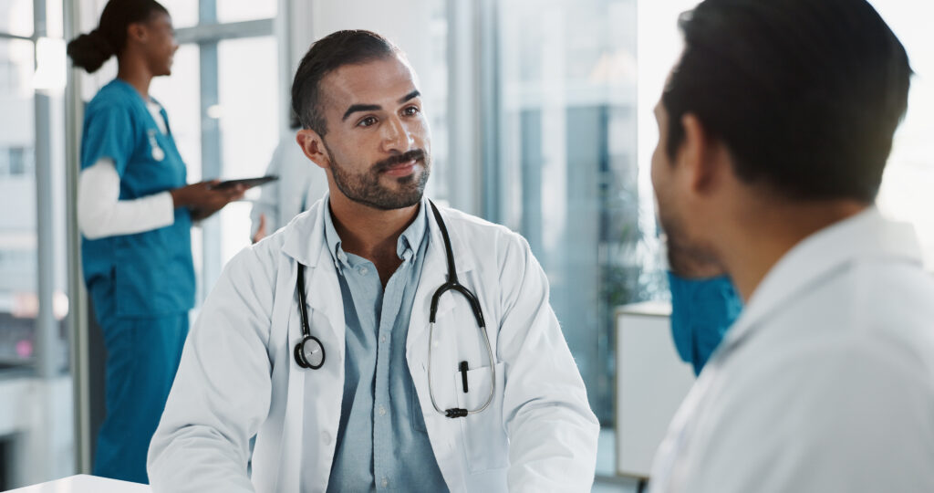 male physician in interview